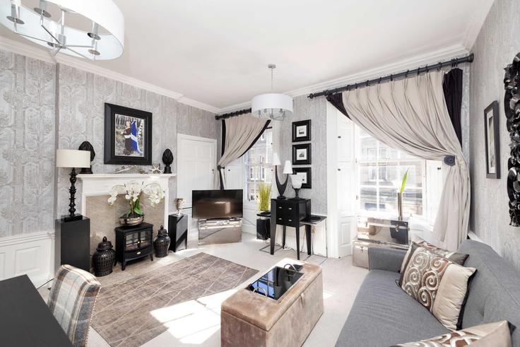 Edinburgh New Town/BroughtonのBuilding Thistle Street - joivy - 1075966のアパートメントにある、モダンな家具を備えたエレガントなデザインのリビングルーム