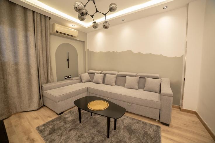 El Nozha, Cairo에 위치한 Building Abdallah Ibn Rawaha - jolie-havens - 1405002 유닛의 세련된 인테리어가 돋보이는 거실