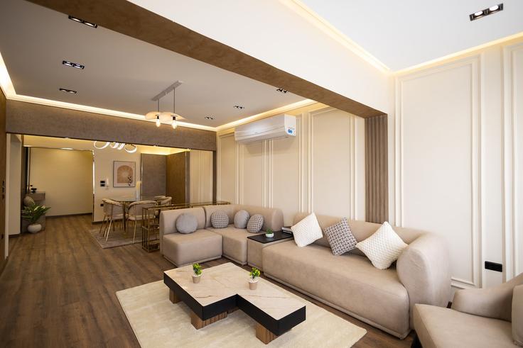 Sala de estar elegantemente projetada com móveis modernos em um apartamento no Building Ammar Ibn Yasser - jolie-havens - 1404997 em El Nozha, Cairo