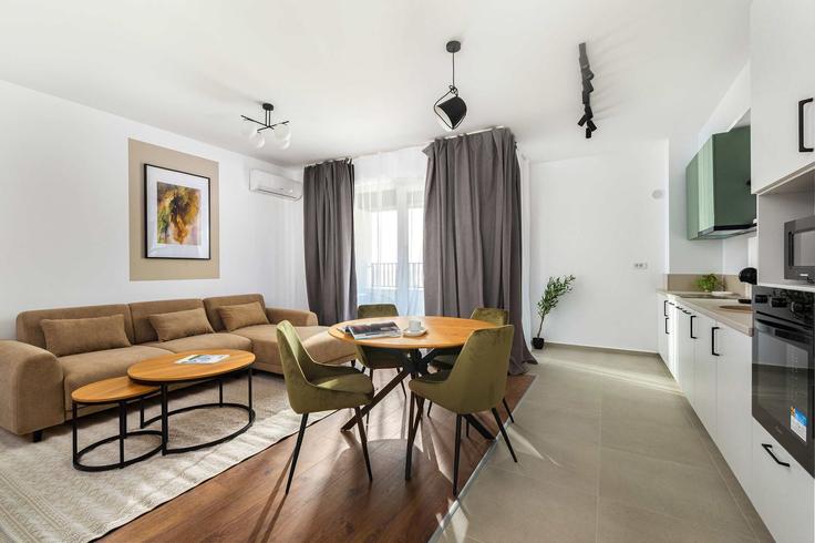 Elegantly designed living room with modern furnishings in an apartment at Building Calea Circumvalațiunii - joy-city-stay - 1272411 in Timișoara, Timișoara Elegantly designed living room with modern furnishings in an apartment at Building Calea Circumvalațiunii - joy-city-stay - 1272411 in Timișoara, Timișoara
