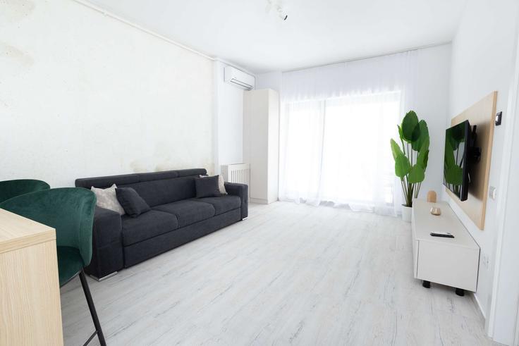 Building Strada Brizei - joy-city-stay - 1272467 - ROU adresindeki bir dairede modern mobilyalarla zarif bir şekilde tasarlanmış oturma odası Constanța, Constanța