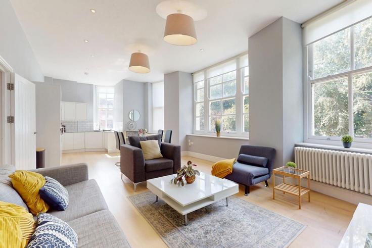 Salle de séjour élégante avec mobilier moderne dans un appartement à Building Mount Stuart Square - jry-property-group - 1633776 à Butetown, Cardiff Salle de séjour élégante avec mobilier moderne dans un appartement à Building Mount Stuart Square - jry-property-group - 1633776 à Butetown, Cardiff
