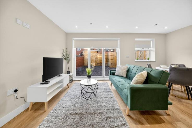 Salle de séjour élégante avec mobilier moderne dans un appartement à Building Oakfield Street - jry-property-group - 1643583 à Adamsdown, Cardiff Salle de séjour élégante avec mobilier moderne dans un appartement à Building Oakfield Street - jry-property-group - 1643583 à Adamsdown, Cardiff