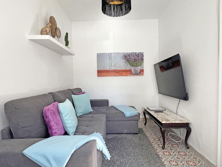 Elegante sala de estar con mobiliario moderno en un apartamento en Building Travessa das Figueiras - junto-ao-mar - 1407063 en Santa Maria, Tavira