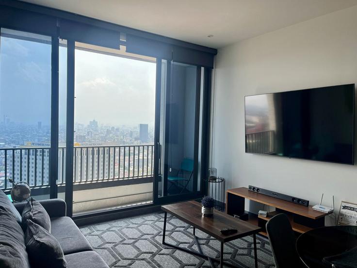 Salle de séjour élégante avec mobilier moderne dans un appartement à Building Lafragua - kar-memijes-stays - 1575003 à Mexico City, Mexico City Salle de séjour élégante avec mobilier moderne dans un appartement à Building Lafragua - kar-memijes-stays - 1575003 à Mexico City, Mexico City