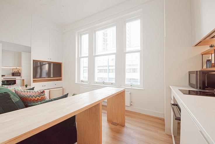 Elegante sala de estar con mobiliario moderno en un apartamento en Building London Mews - keey - 1520626 en City of Westminster, London Elegante sala de estar con mobiliario moderno en un apartamento en Building London Mews - keey - 1520626 en City of Westminster, London