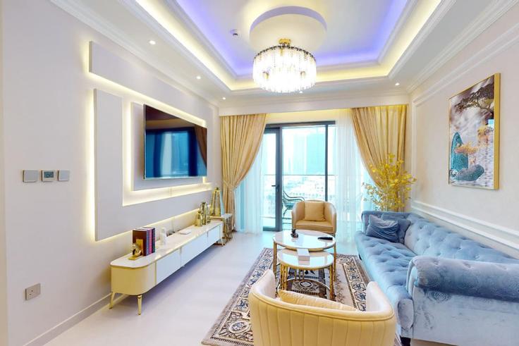 Elegant gestaltetes Wohnzimmer mit moderner Einrichtung in einer Wohnung im Building Burj Khalifa Boulevard - kensington-holiday-homes-rental-llc - 1232679 in Downtown Dubai, Dubai