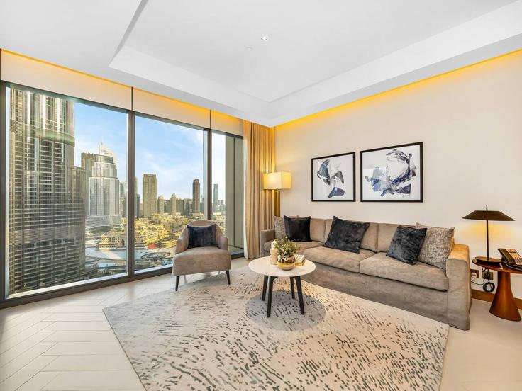 Downtown Dubai, Dubai에 위치한 Building Tariaq Bedon Esm - kensington-holiday-homes-rental-llc - 1256071 - DXB 유닛의 세련된 인테리어가 돋보이는 거실