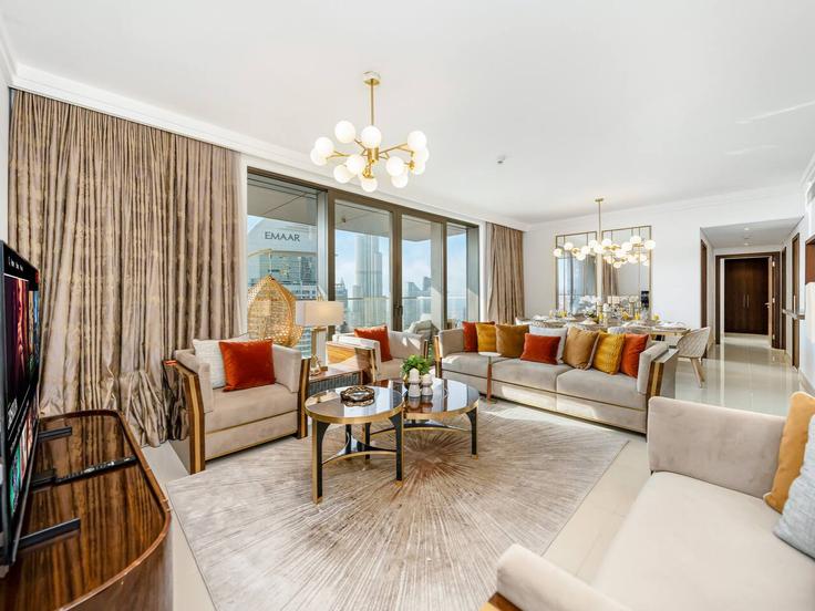 Salle de séjour élégante avec mobilier moderne dans un appartement à Building Sheikh Mohammed bin Rashid Boulevard - kensington-holiday-homes-rental-llc - 1358040 à Downtown Dubai, Dubai