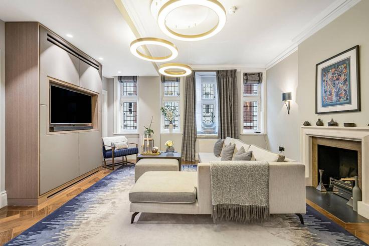 Elegante sala de estar con mobiliario moderno en un apartamento en Building Bury Street - kenton-hostaway - 1323251 en City of Westminster, London