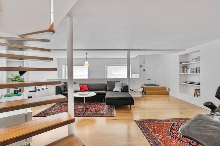 Elegante sala de estar con mobiliario moderno en un apartamento en Building Penzance Place - kenton-hostaway - 1521014 en Royal Borough of Kensington and Chelsea, London Elegante sala de estar con mobiliario moderno en un apartamento en Building Penzance Place - kenton-hostaway - 1521014 en Royal Borough of Kensington and Chelsea, London