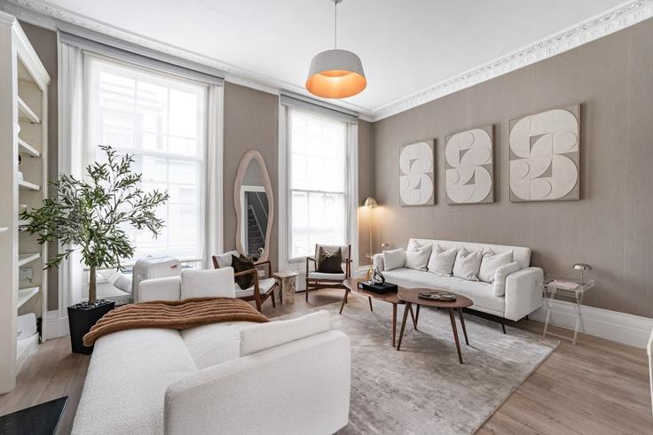 London Royal Borough of Kensington and ChelseaのBuilding Anderson Street - kenton-hostaway - 1569700のアパートメントにある、モダンな家具を備えたエレガントなデザインのリビングルーム