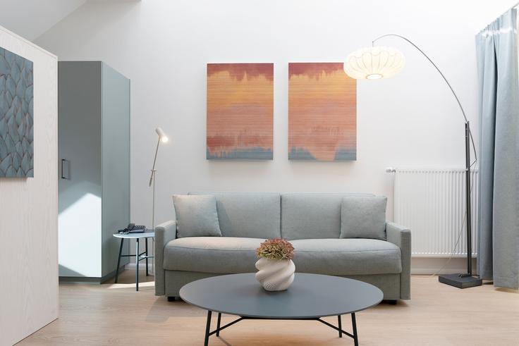 Sala de estar elegantemente projetada com móveis modernos em um apartamento no Building Rue Albert 1Er - key-inn-serviced-residences - 1580639 em Luxembourg, Luxembourg Sala de estar elegantemente projetada com móveis modernos em um apartamento no Building Rue Albert 1Er - key-inn-serviced-residences - 1580639 em Luxembourg, Luxembourg