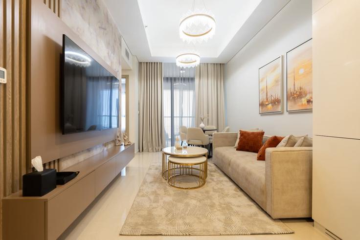 Elegantly designed living room with modern furnishings in an apartment at Building Tariaq Bedon Esm - keyrock-holiday-homes - 1261319 - DXB in Business Bay, Dubai Elegantly designed living room with modern furnishings in an apartment at Building Tariaq Bedon Esm - keyrock-holiday-homes - 1261319 - DXB in Business Bay, Dubai