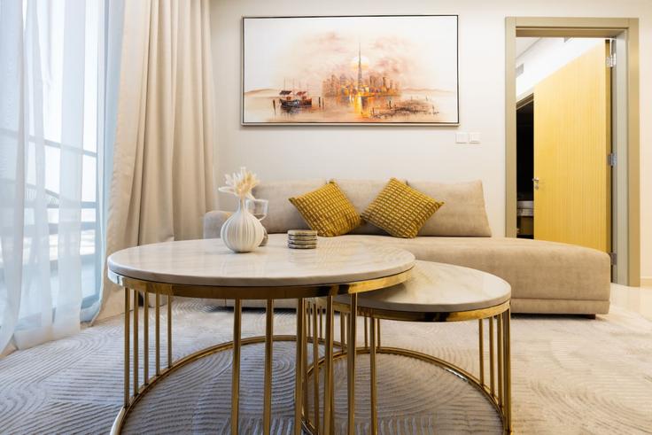 Elegantly designed living room with modern furnishings in an apartment at Building Tariaq Bedon Esm - keyrock-holiday-homes - 1261298 - DXB in Business Bay, Dubai Elegantly designed living room with modern furnishings in an apartment at Building Tariaq Bedon Esm - keyrock-holiday-homes - 1261298 - DXB in Business Bay, Dubai