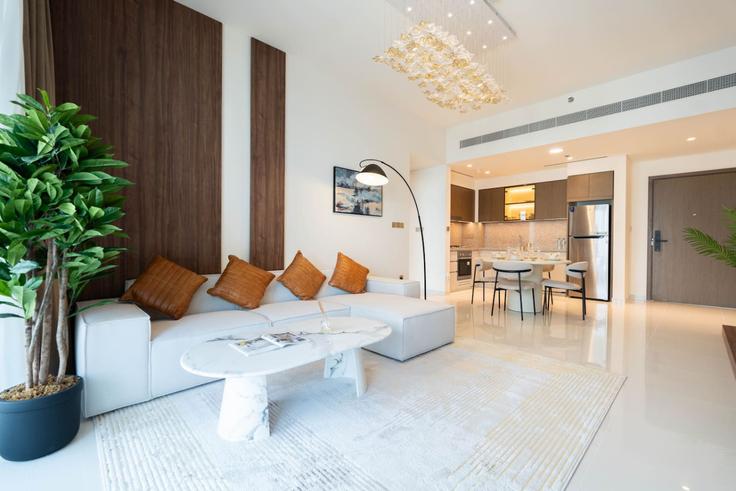 Elegantly designed living room with modern furnishings in an apartment at Building Tariaq Bedon Esm - keyrock-holiday-homes - 1264795 - DXB in The Palm Jumeirah, Dubai Elegantly designed living room with modern furnishings in an apartment at Building Tariaq Bedon Esm - keyrock-holiday-homes - 1264795 - DXB in The Palm Jumeirah, Dubai