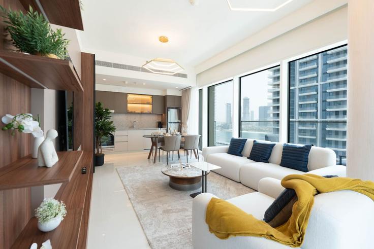 Salle de séjour élégante avec mobilier moderne dans un appartement à Building Tariaq Bedon Esm - keyrock-holiday-homes - 1264798 - DXB à The Palm Jumeirah, Dubai Salle de séjour élégante avec mobilier moderne dans un appartement à Building Tariaq Bedon Esm - keyrock-holiday-homes - 1264798 - DXB à The Palm Jumeirah, Dubai