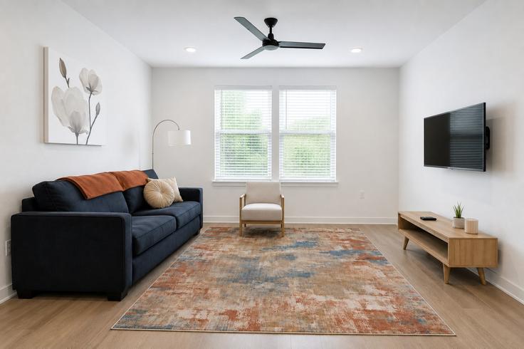 Sala de estar elegantemente projetada com móveis modernos em um apartamento no Building Graham Drive - kk-housing - 1579152 em Sherman, Sherman