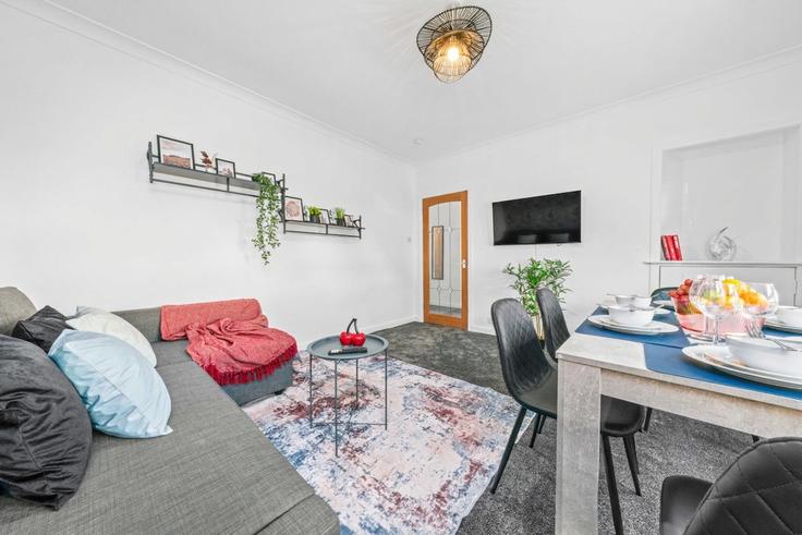 Sala de estar elegantemente projetada com móveis modernos em um apartamento no Building Oxford Street - klass-living-ltd - 1424239 em Langloan, Coatbridge