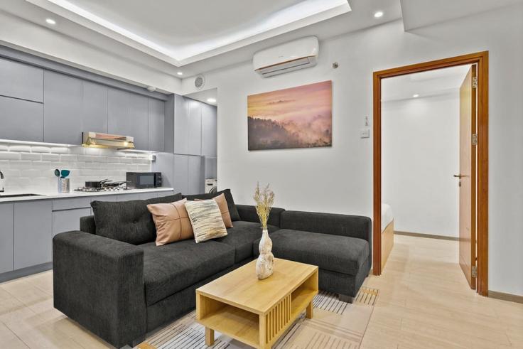 Salle de séjour élégante avec mobilier moderne dans un appartement à Building Jalan R.A. Kartini - kozystay-1 - 1529705 à Cilandak, South Jakarta City Salle de séjour élégante avec mobilier moderne dans un appartement à Building Jalan R.A. Kartini - kozystay-1 - 1529705 à Cilandak, South Jakarta City