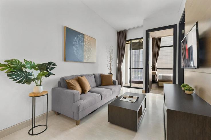 Sala de estar elegantemente projetada com móveis modernos em um apartamento no Building Jalan Bendungan Hilir 1 - kozystay-1 - 1541855 em Tanah Abang, Central Jakarta City Sala de estar elegantemente projetada com móveis modernos em um apartamento no Building Jalan Bendungan Hilir 1 - kozystay-1 - 1541855 em Tanah Abang, Central Jakarta City