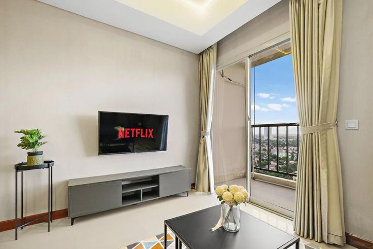 Sala de estar elegantemente projetada com móveis modernos em um apartamento no Building Jalan Sultan Iskandar Muda - kozystay-1 - 1529716 em Kebayoran Lama, South Jakarta City Sala de estar elegantemente projetada com móveis modernos em um apartamento no Building Jalan Sultan Iskandar Muda - kozystay-1 - 1529716 em Kebayoran Lama, South Jakarta City