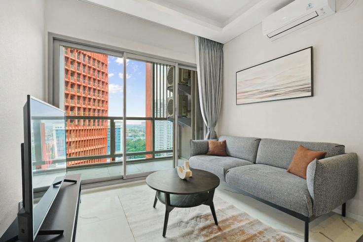 Salle de séjour élégante avec mobilier moderne dans un appartement à Building Jalan Makmur - kozystay-1 - 1529572 à Cilandak, South Jakarta City Salle de séjour élégante avec mobilier moderne dans un appartement à Building Jalan Makmur - kozystay-1 - 1529572 à Cilandak, South Jakarta City