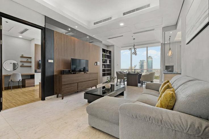 Elegant gestaltetes Wohnzimmer mit moderner Einrichtung in einer Wohnung im Building Jalan Setiabudi Raya - kozystay-1 - 1699120 in South Jakarta, Jakarta Elegant gestaltetes Wohnzimmer mit moderner Einrichtung in einer Wohnung im Building Jalan Setiabudi Raya - kozystay-1 - 1699120 in South Jakarta, Jakarta
