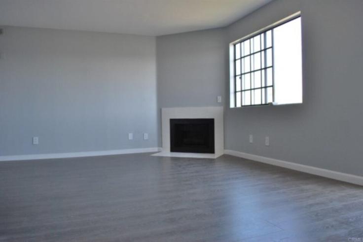 Elegantly designed living room with modern furnishings in an apartment at Building Ohio Street - kubandaproperties - 1360025 in San Diego, San Diego
