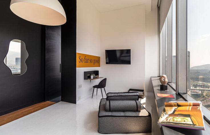 Elegantly designed living room with modern furnishings in an apartment at Building Juan Salvador Agraz - kukun - 1022771 in Mexico City, Mexico City
