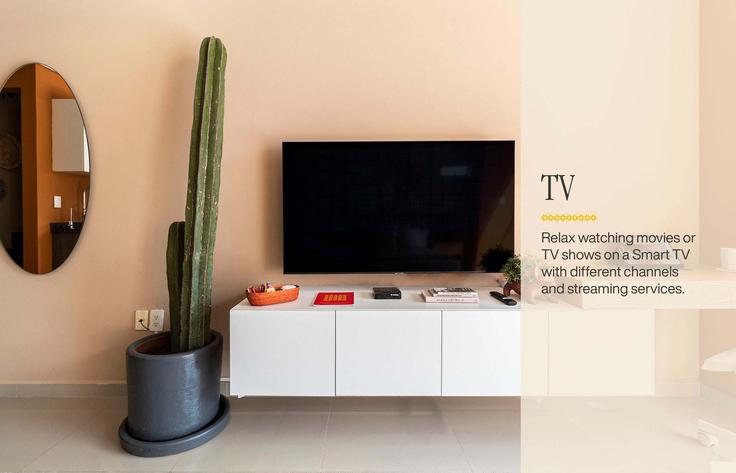 Elegante sala de estar con mobiliario moderno en un apartamento en Building Sinaloa - kukun - 1022657 - MEX en Mexico City, Mexico City Elegante sala de estar con mobiliario moderno en un apartamento en Building Sinaloa - kukun - 1022657 - MEX en Mexico City, Mexico City