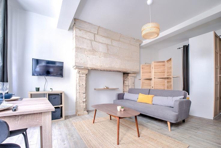 Elegante sala de estar con mobiliario moderno en un apartamento en Building 7 Rue de la Sagesse, 24000 Périgueux, France - la-conciergerie-du-perigord - 1640064 en Périgueux, Périgueux Elegante sala de estar con mobiliario moderno en un apartamento en Building 7 Rue de la Sagesse, 24000 Périgueux, France - la-conciergerie-du-perigord - 1640064 en Périgueux, Périgueux