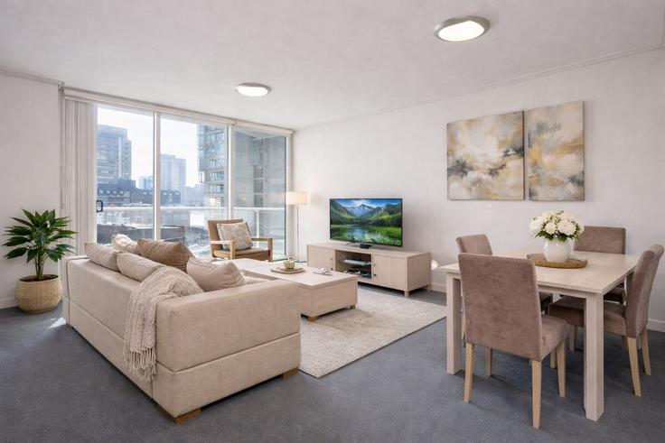 Elegant gestaltetes Wohnzimmer mit moderner Einrichtung in einer Wohnung im Building Albert Street - lane-property - 1470190 in Brisbane City, Brisbane