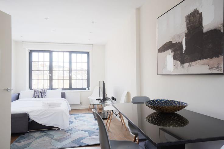 Elegante sala de estar con mobiliario moderno en un apartamento en Building Omega Place - lb73-management - 1330213 en London Borough of Islington, London Elegante sala de estar con mobiliario moderno en un apartamento en Building Omega Place - lb73-management - 1330213 en London Borough of Islington, London