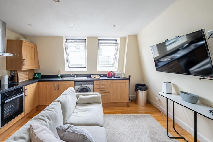 Elegante sala de estar con mobiliario moderno en un apartamento en Building Camden Road - lb73-management - 1330230 en London Borough of Islington, London Elegante sala de estar con mobiliario moderno en un apartamento en Building Camden Road - lb73-management - 1330230 en London Borough of Islington, London