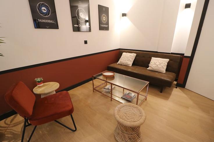 Elegantly designed living room with modern furnishings in an apartment at Building Passage Lisa - le-porte-clefs - 1537420 in 11th arrondissement, Paris