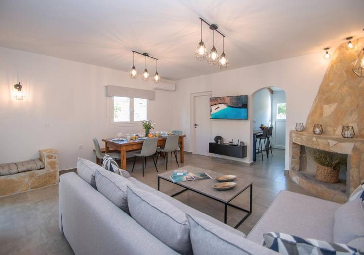 Sala de estar elegantemente projetada com móveis modernos em um apartamento no Building Elation - leaderstay - 1347753 em Zakynthos, Zakynthos Sala de estar elegantemente projetada com móveis modernos em um apartamento no Building Elation - leaderstay - 1347753 em Zakynthos, Zakynthos
