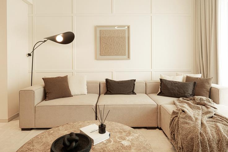 Elegantly designed living room with modern furnishings in an apartment at Building Tariaq Bedon Esm - let2rent-hostaway - 1050285 - DXB in Marsa Dubai, Dubai