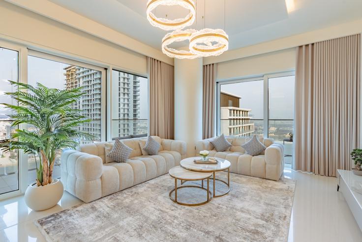 Elegantly designed living room with modern furnishings in an apartment at Building Tariaq Bedon Esm - let2rent-hostaway - 1309461 - DXB in The Palm Jumeirah, Dubai Elegantly designed living room with modern furnishings in an apartment at Building Tariaq Bedon Esm - let2rent-hostaway - 1309461 - DXB in The Palm Jumeirah, Dubai