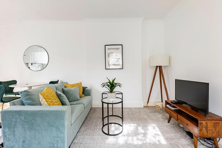 Elegantly designed living room with modern furnishings in an apartment at Building Lidyard Road - lettsgetsmart-limited - 1563260 in London Borough of Islington, London Elegantly designed living room with modern furnishings in an apartment at Building Lidyard Road - lettsgetsmart-limited - 1563260 in London Borough of Islington, London