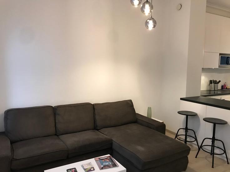 Elegant gestaltetes Wohnzimmer mit moderner Einrichtung in einer Wohnung im Building Rue Henri Lamormesnil - letzbnb - 1253921 - LUX in Luxembourg, Luxembourg