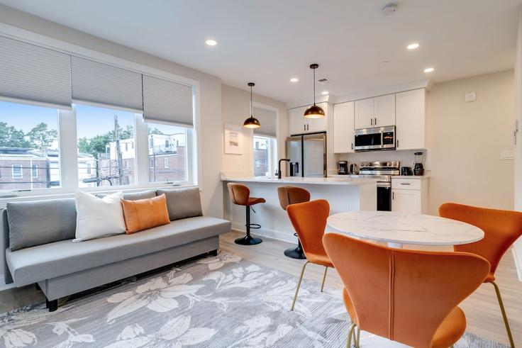 Elegantly designed living room with modern furnishings in an apartment at Building Kennedy Street Northwest - leyla-matt - 1582714 in Washington, Washington