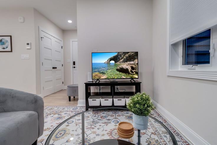 Elegantly designed living room with modern furnishings in an apartment at Building Kennedy Street Northwest - leyla-matt - 1582712 in Washington, Washington