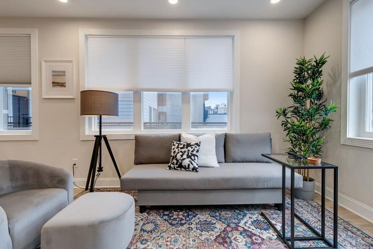 Elegantly designed living room with modern furnishings in an apartment at Building Kennedy Street Northwest - leyla-matt - 1582505 in Washington, Washington