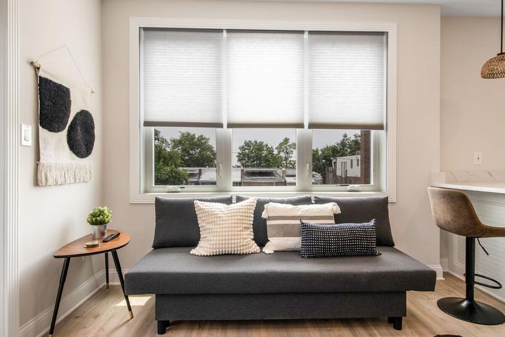 Elegantly designed living room with modern furnishings in an apartment at Building Kennedy Street Northwest - leyla-matt - 1582628 in Washington, Washington