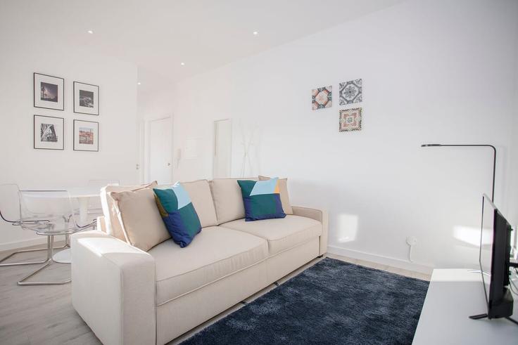 Salle de séjour élégante avec mobilier moderne dans un appartement à Building Rua do Almada - liiiving - 1335612 à União das freguesias de Cedofeita, Santo Ildefonso, Sé, Miragaia, São Nicolau e Vitória, Porto