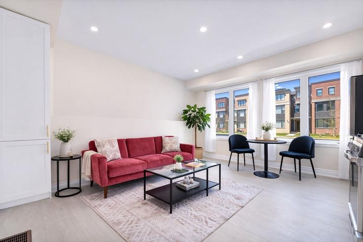 Salle de séjour élégante avec mobilier moderne dans un appartement à Building Millicent Avenue - likehouse-properties - 1648802 à Oakville, Oakville Salle de séjour élégante avec mobilier moderne dans un appartement à Building Millicent Avenue - likehouse-properties - 1648802 à Oakville, Oakville