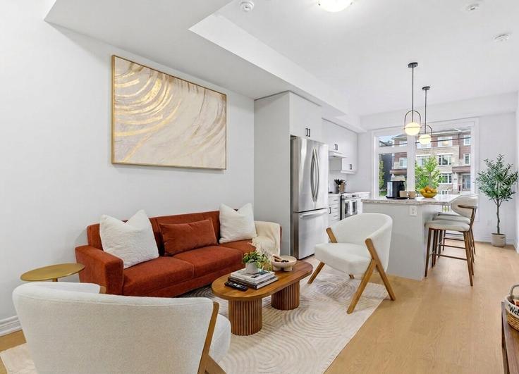 Oakville OakvilleのBuilding Sixth Line - likehouse-properties - 1648808のアパートメントにある、モダンな家具を備えたエレガントなデザインのリビングルーム Oakville OakvilleのBuilding Sixth Line - likehouse-properties - 1648808のアパートメントにある、モダンな家具を備えたエレガントなデザインのリビングルーム