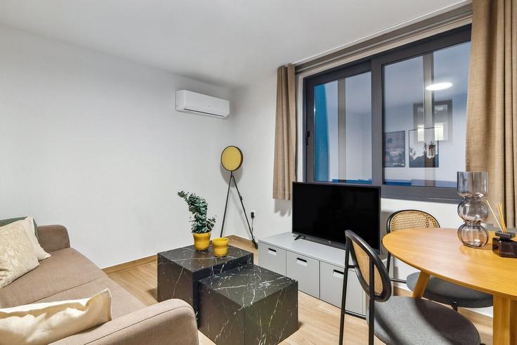 Elegantly designed living room with modern furnishings in an apartment at Building Solonos - limehome - 1037994 in Central Athens, Athens Elegantly designed living room with modern furnishings in an apartment at Building Solonos - limehome - 1037994 in Central Athens, Athens