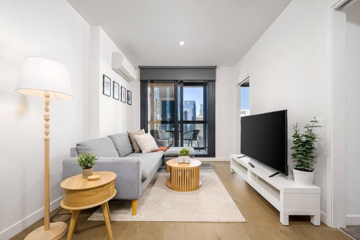 Salle de séjour élégante avec mobilier moderne dans un appartement à Building Little Lonsdale Street - live-luxe - 1646014 à Melbourne, Melbourne Salle de séjour élégante avec mobilier moderne dans un appartement à Building Little Lonsdale Street - live-luxe - 1646014 à Melbourne, Melbourne